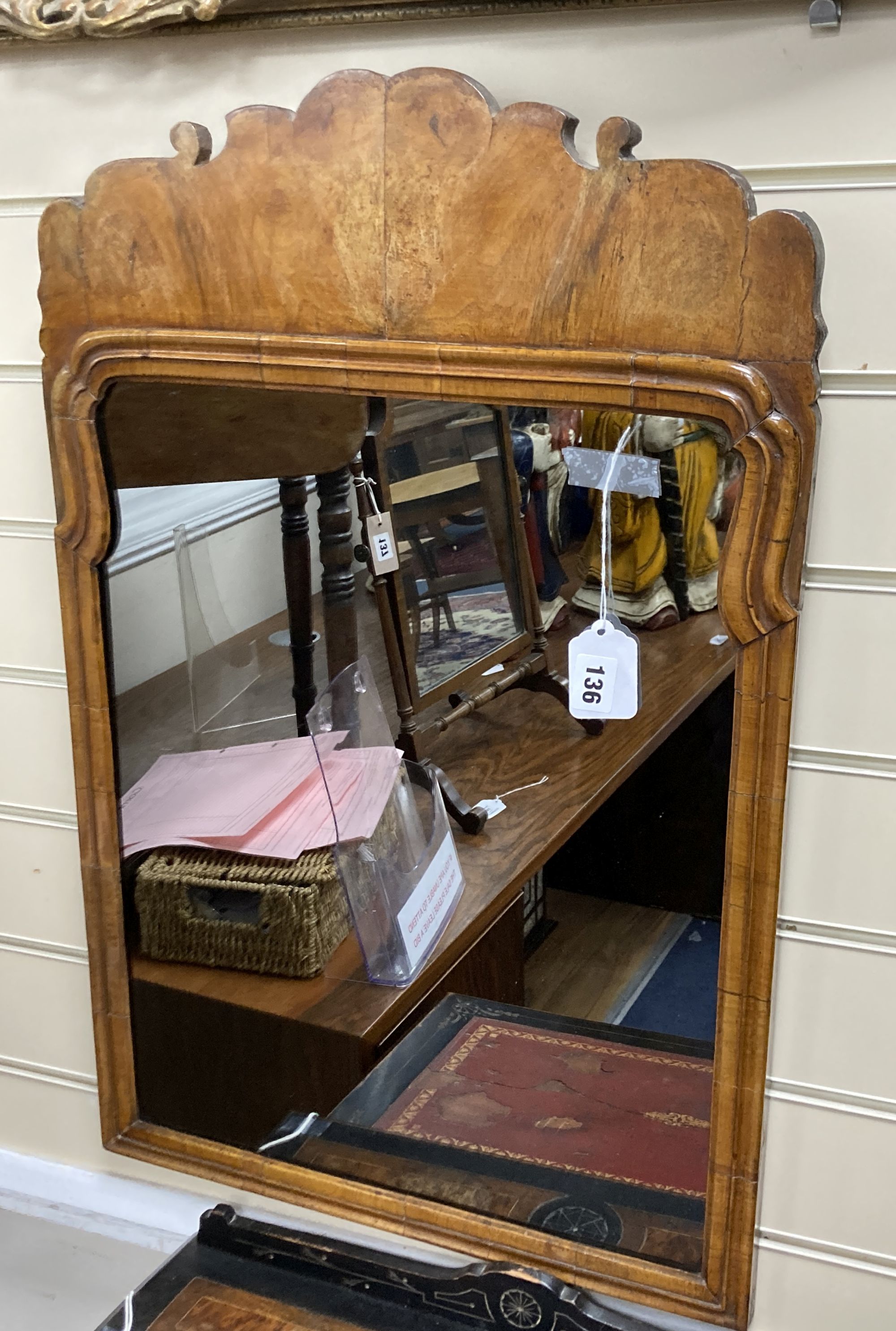 An 18th century walnut fret cut wall mirror, width 56cm, height 86cm